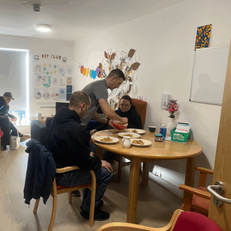 Sean Assisting Clients